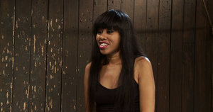 18 year old female Doris G slips off her underwear to pose naked on her bed